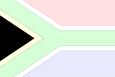 Flaga Republiki Południowej Afryki. Czarny trójkąt symbolizuje ludność czarną, a reszta – białą
